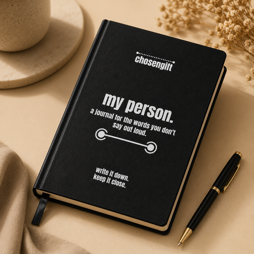 Close-up of personalized black faux leather journal cover