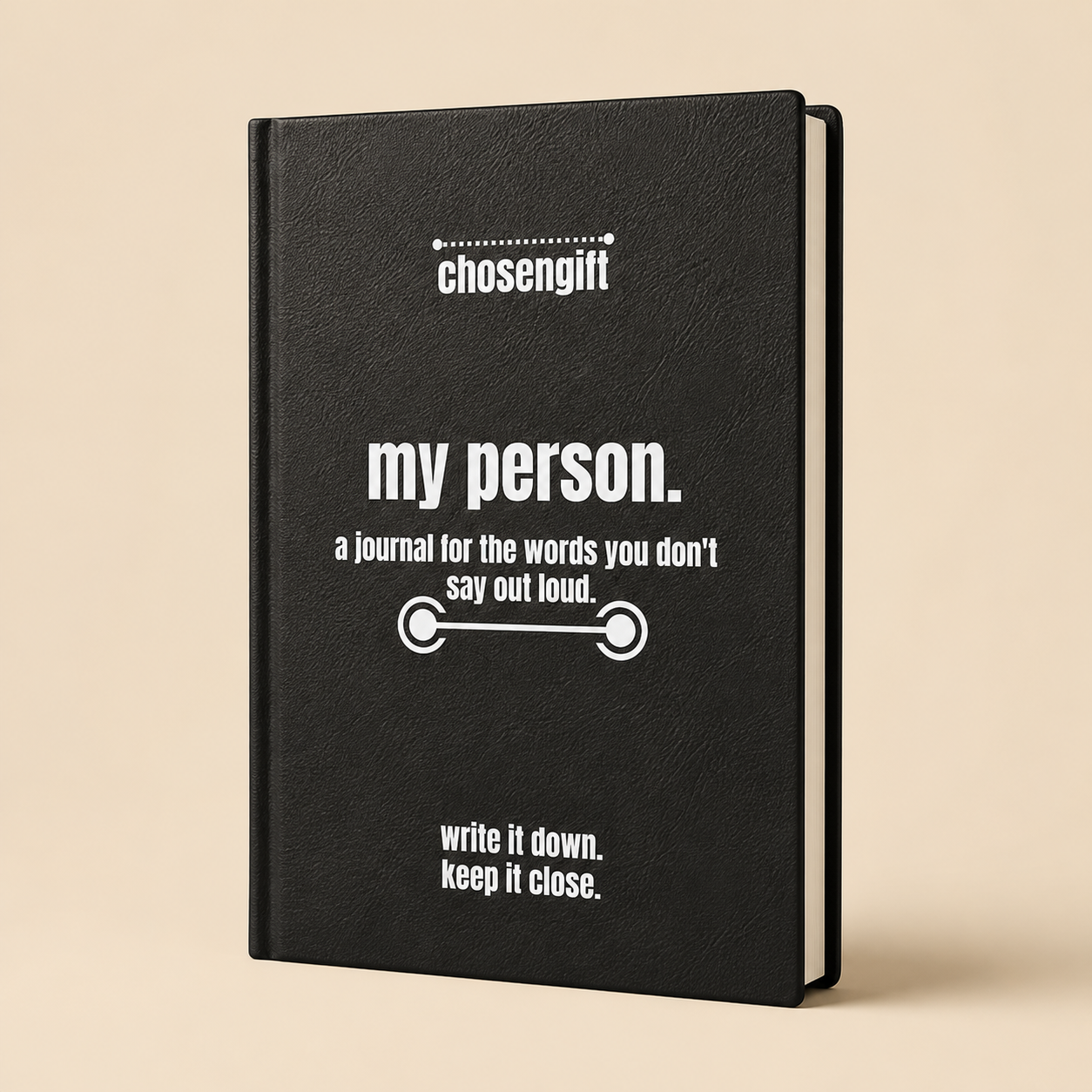 Personalized black vegan leather journal with custom engraved front cover